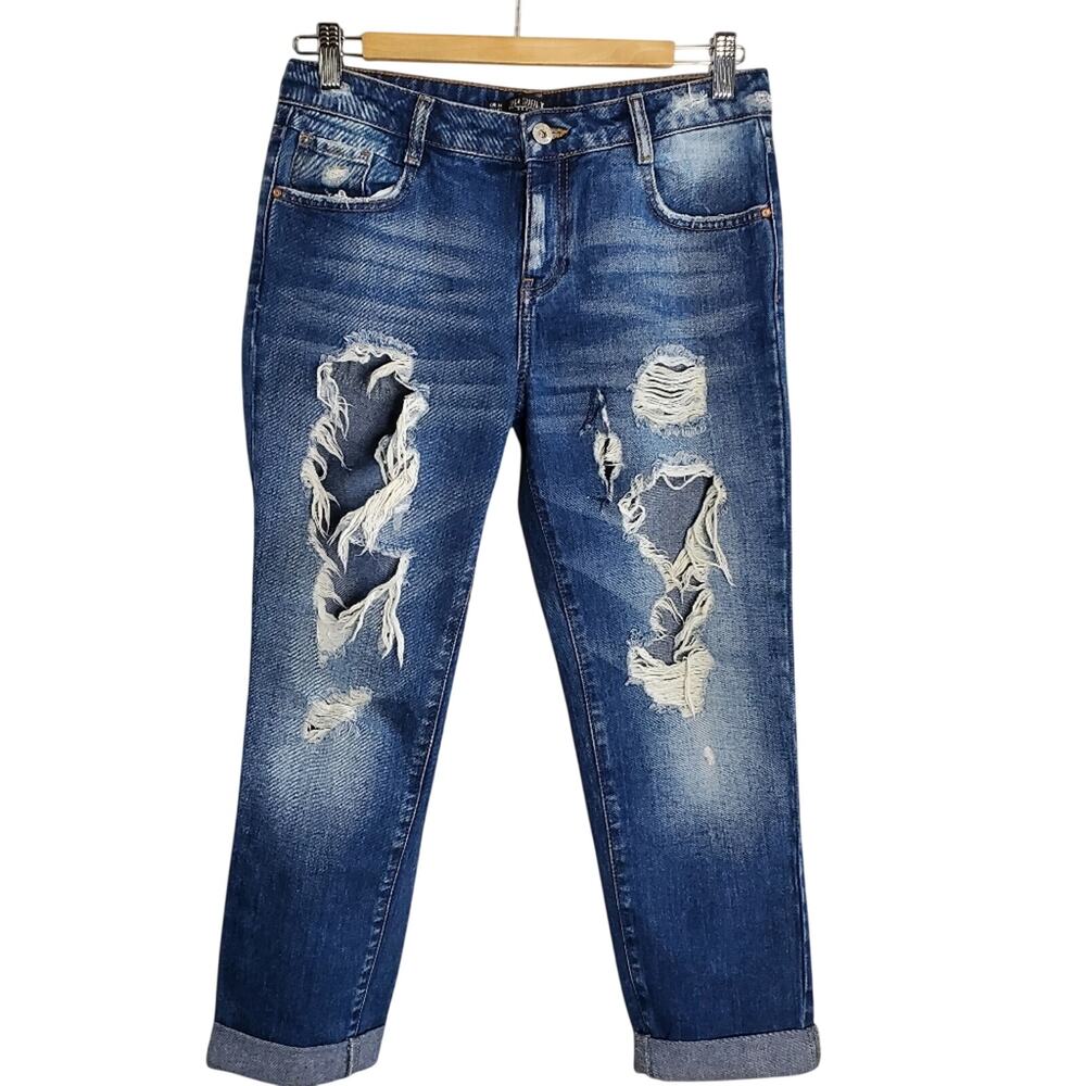 Zara Trafaluc Medium Wash Super Distressed Ripped Denim midrise jeans